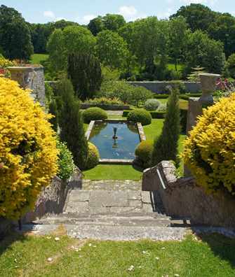 Steps leading down to lily pond at Bodysgallen Hall