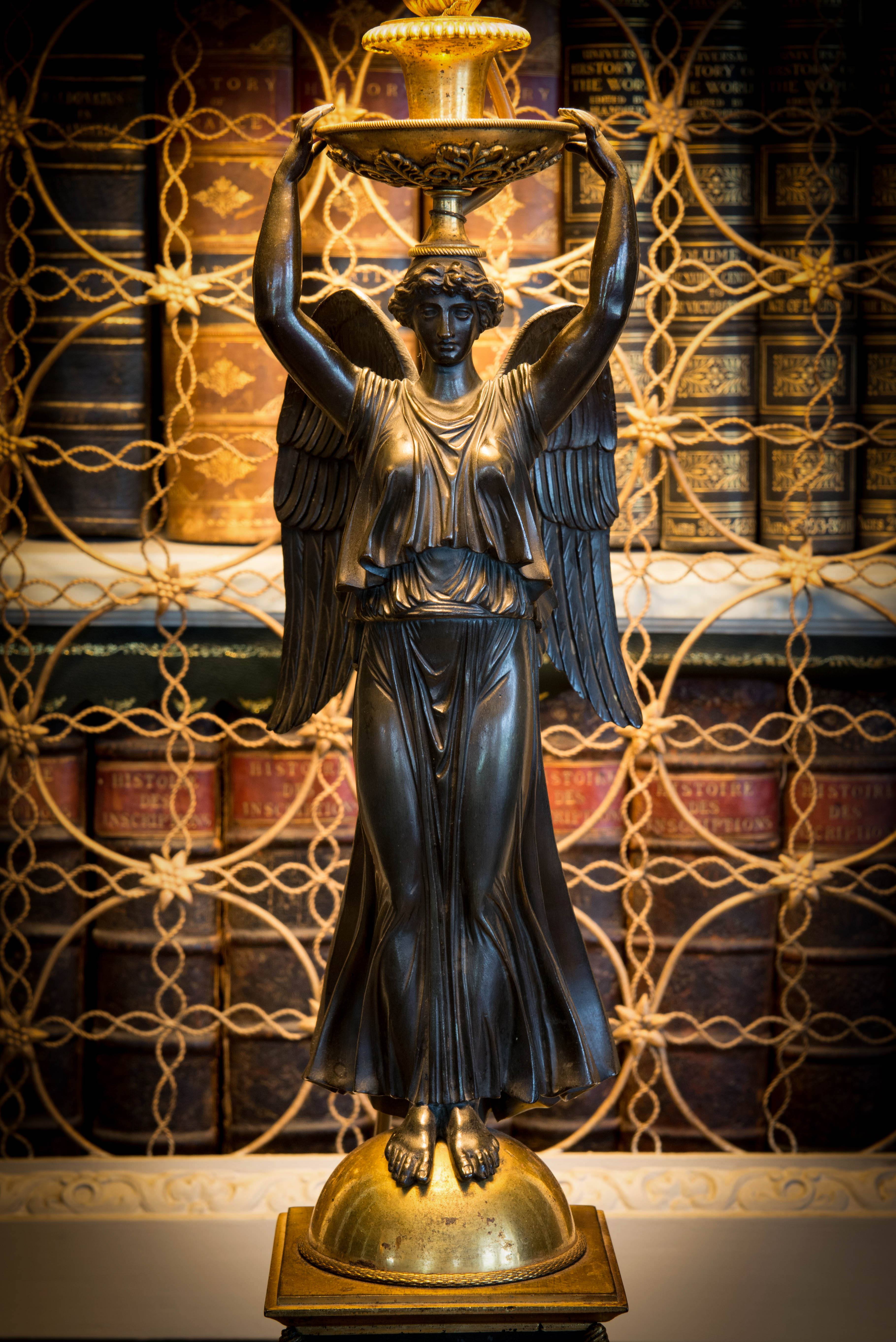 Lamp figurine in Library at Hartwell House